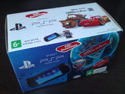 Sony PSP (E1008) оригинал,  в упаковке+две игры и карта памяти.